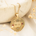 מהש pendant resting on cream vessel with dried flowers