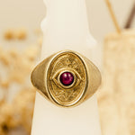 Wisdom & Sefirot Ring displayed on candle, surrounded by dried florals and symbolic golden light