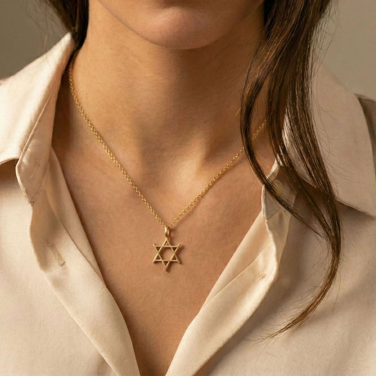 Curved Star of David Necklace in 18K Gold Vermeil worn on a model