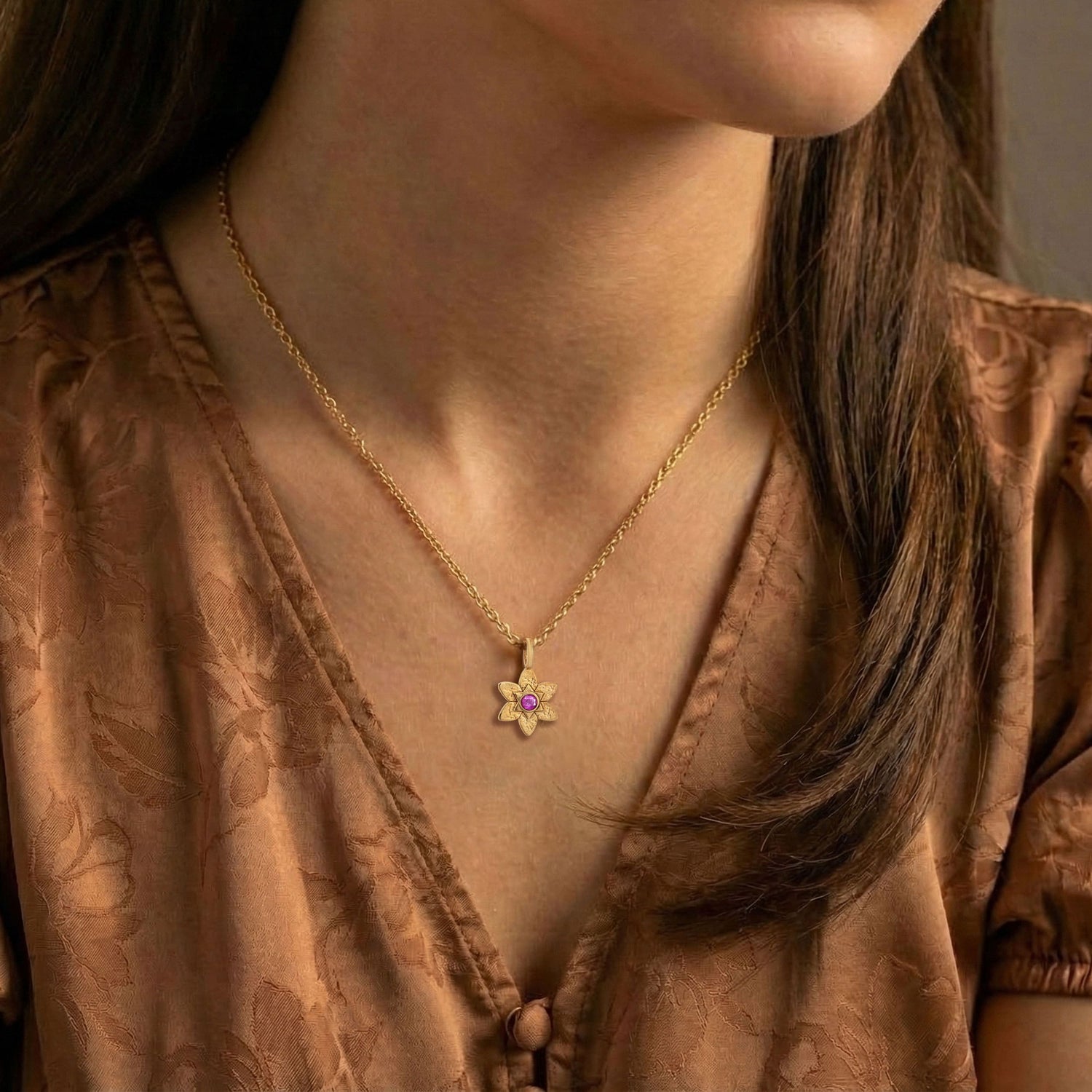 Model wearing the Petal Star of David Necklace in 18K Gold Vermeil with pink sapphire