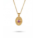 Divine Eye necklace in 14K solid gold with a natural faceted purple sapphire, handcrafted in our Tel Aviv atelier.
