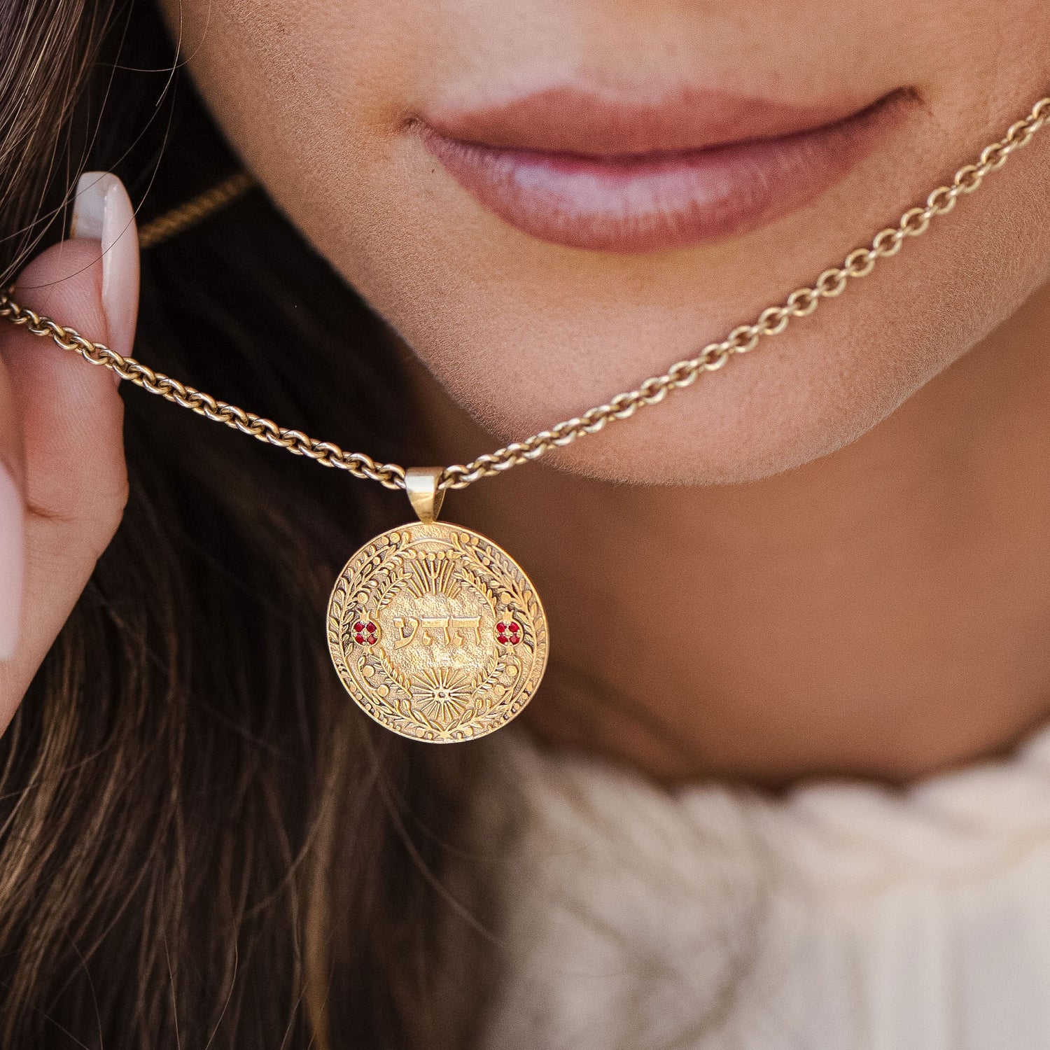 Model wearing ה ה ע pendant close-up portrait