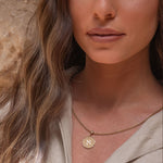 Model profile showing Aleph pendant layered chains