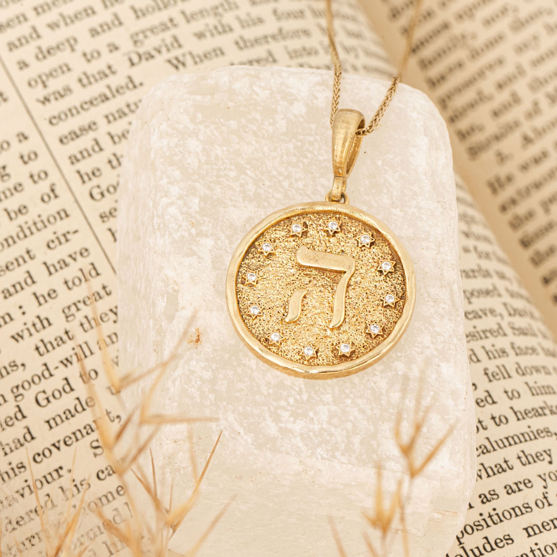 Hey pendant on cream stone  on text