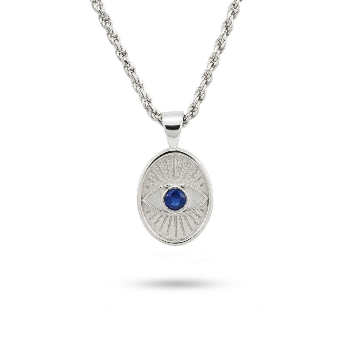 Protective Eye shield necklace in solid silver with a natural faceted dark blue sapphire centerpiece, handcrafted in our Tel Aviv atelier.