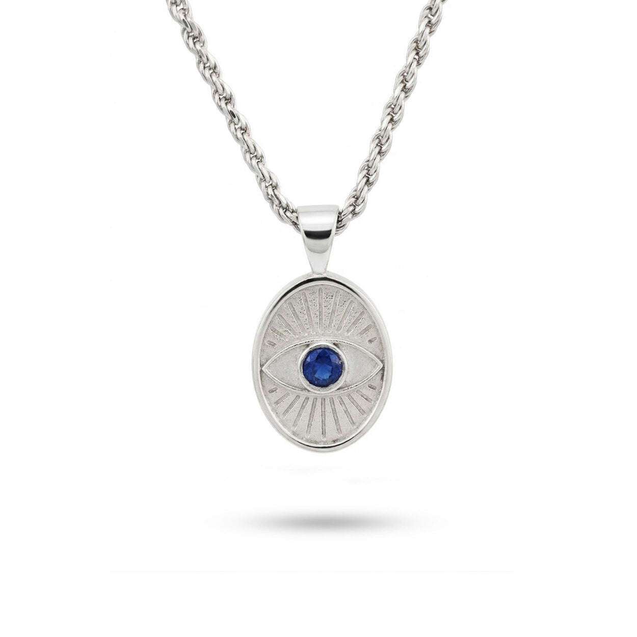 Protective Eye shield necklace in solid silver with a natural faceted dark blue sapphire centerpiece, handcrafted in our Tel Aviv atelier.