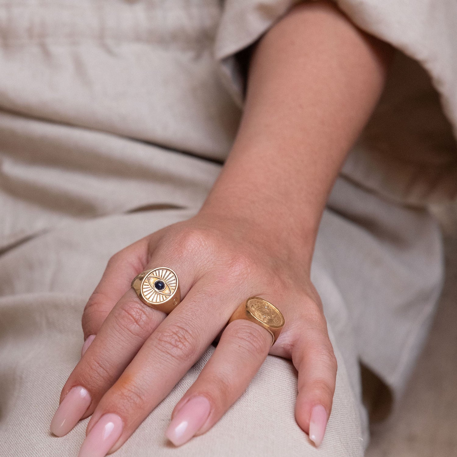 Cozy lifestyle scene featuring model wearing the Protective Eye Ring