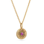 Radiant Star of David necklace in 18K gold vermeil featuring a natural pink sapphire at the center.