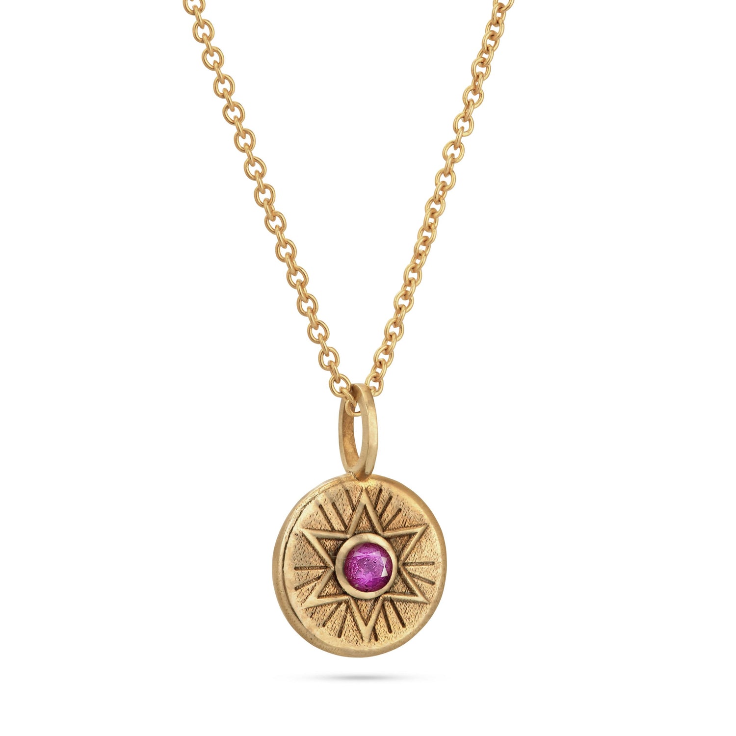 Radiant Star of David necklace in 18K gold vermeil featuring a natural pink sapphire at the center.