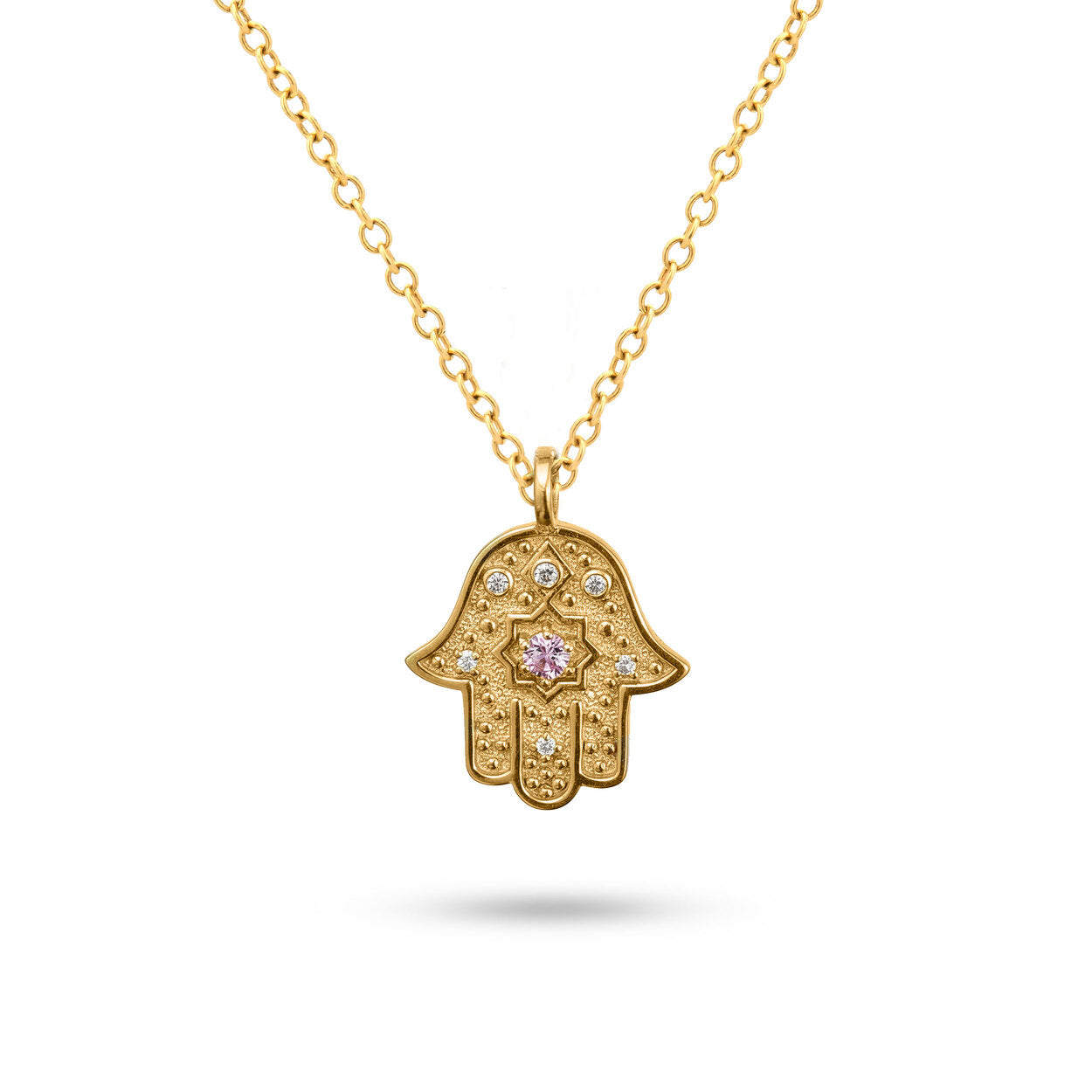 Studio view of the gold Radiant Anchor Hamsa necklace on a clean white background.