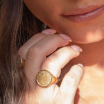 Sarah Ring styled on model’s finger with soft natural lighting