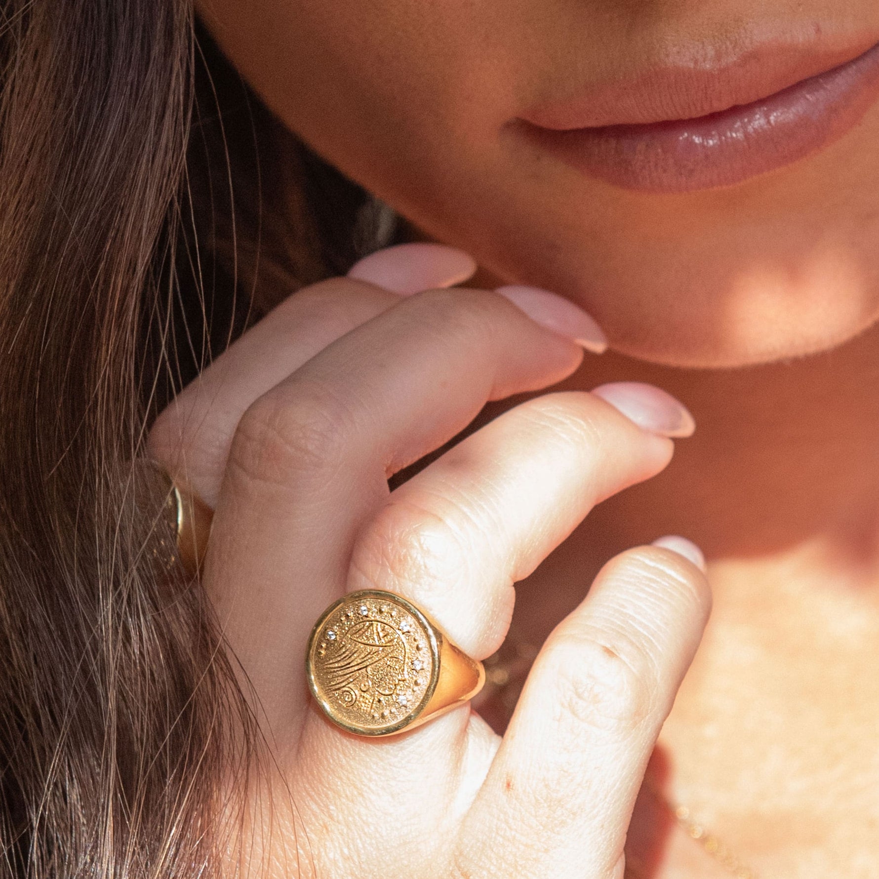 Sarah Ring styled on model’s finger with soft natural lighting