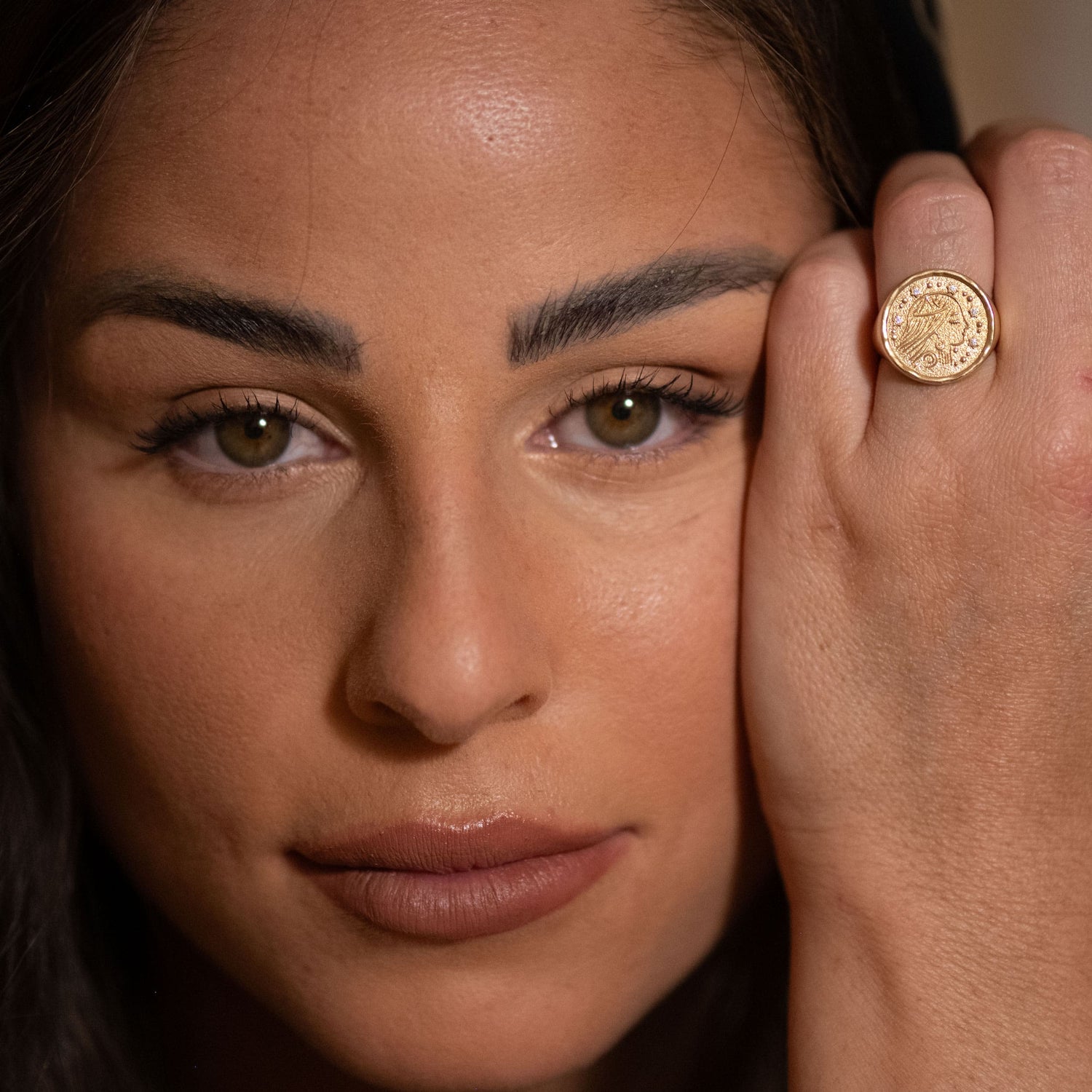 Sarah Ring worn by model, highlighting side profile and ring face